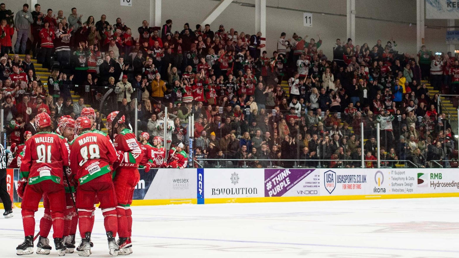 Cardiff Devils in red on the ice at Vindico Arena